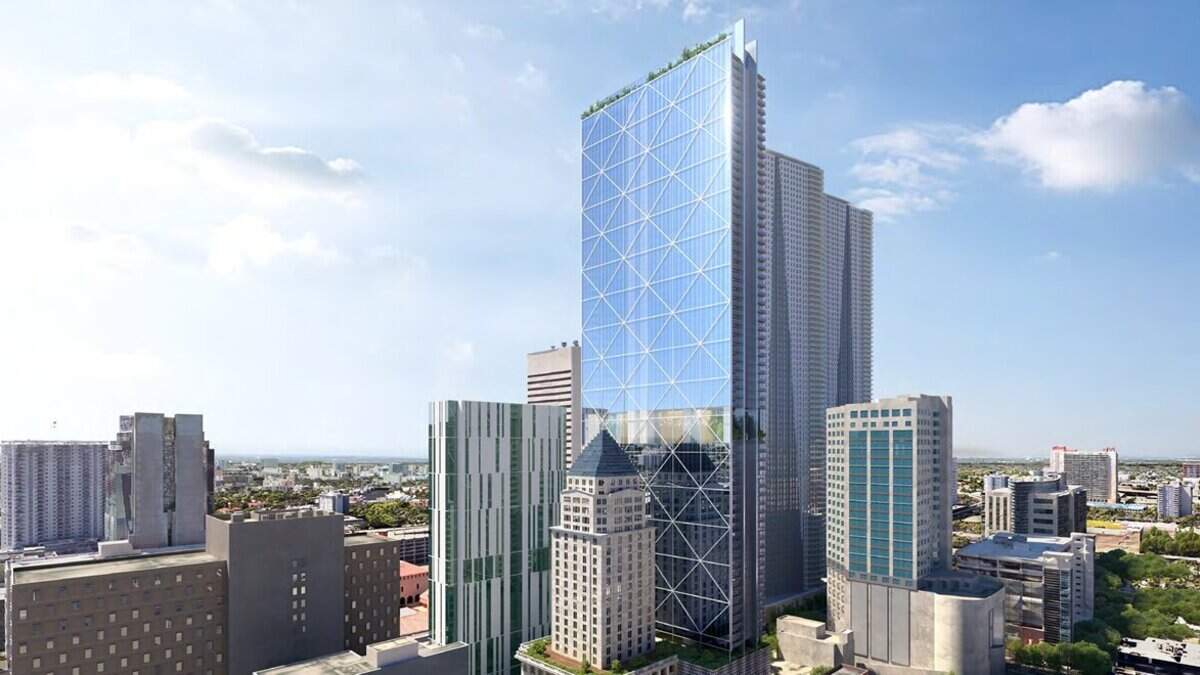 A rendering of how developer Russell Galbut would build a modern apartment tower right next to Miami-Dade County’s historic 1928 courthouse, a building that’s been abandoned for a modern replacement across the street.